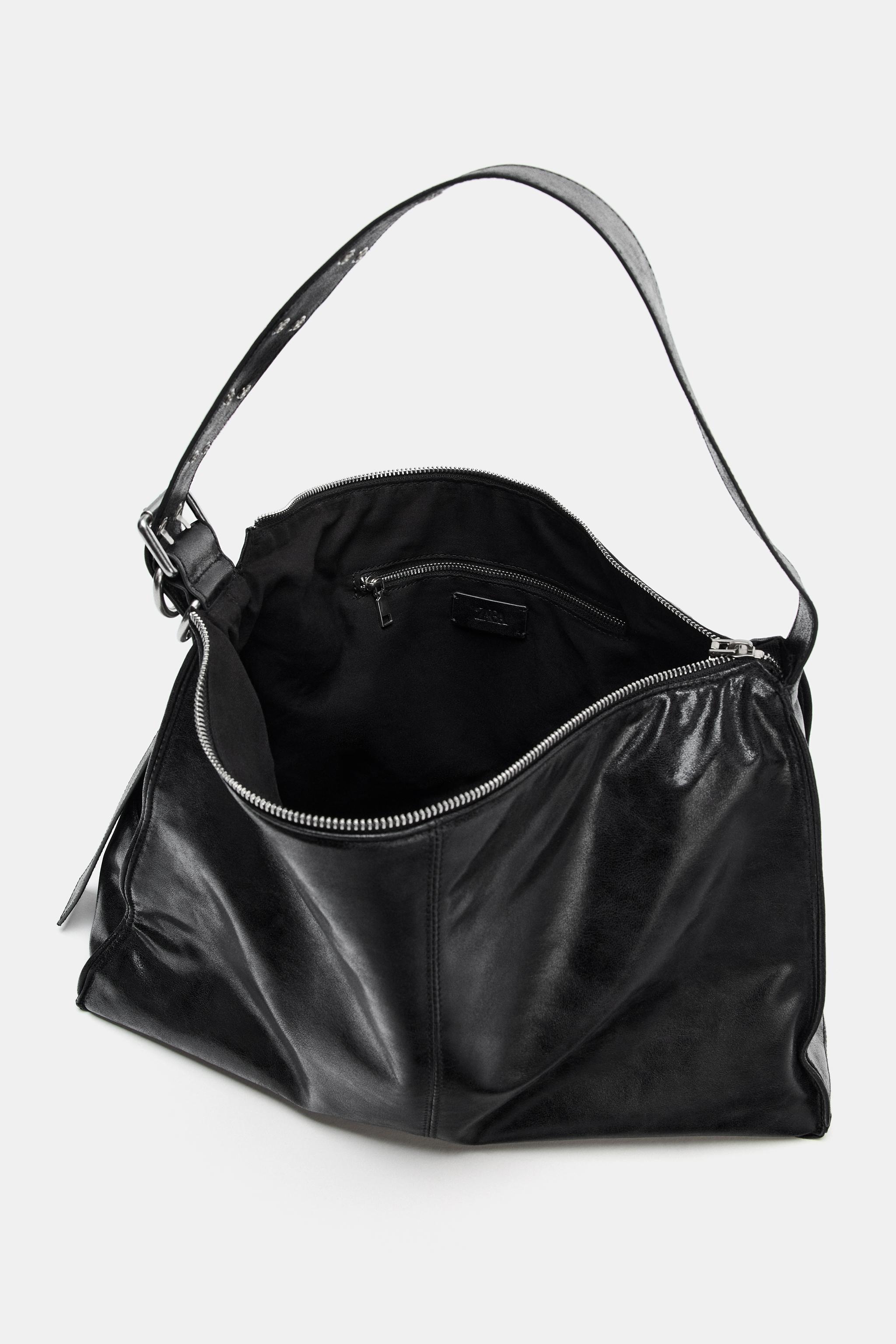 MAXI BUCKET BAG WITH METAL EYELETS